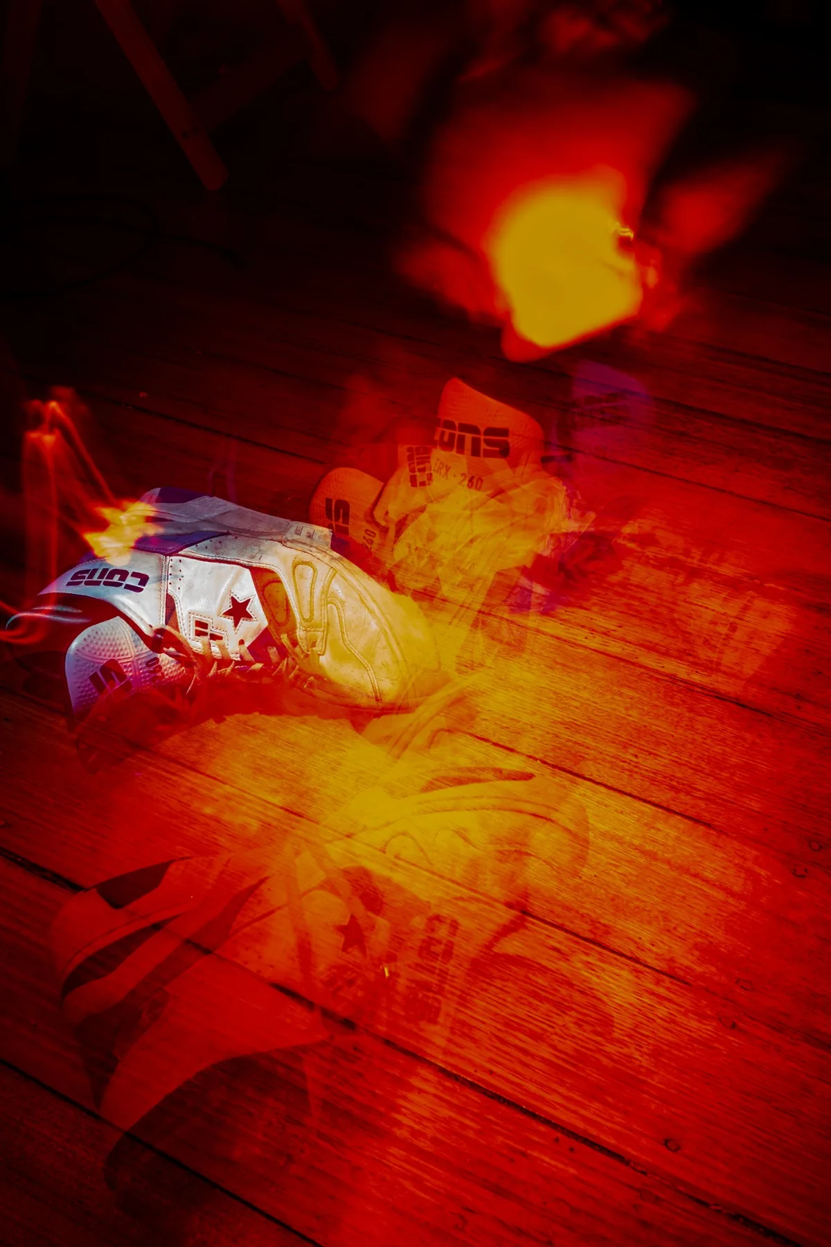Red light painting over shoes